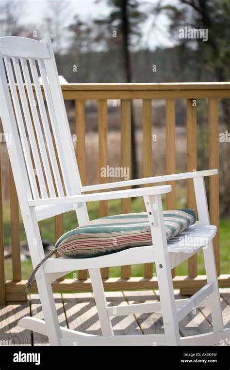 White Rocking Chair On Wooden Deck Or Porch Stock Photo Alamy