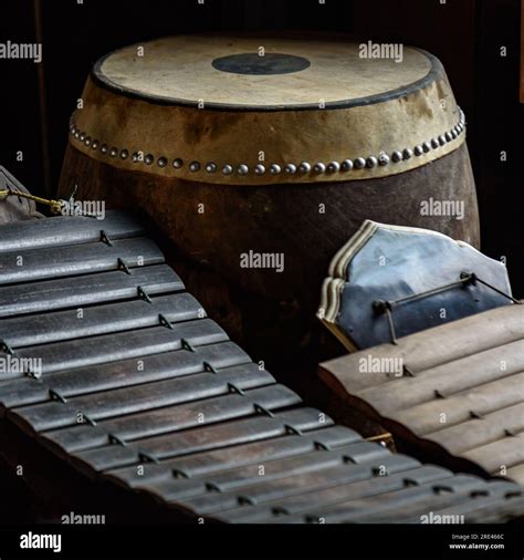 Pictures Of Southeast Asian Musical Instruments With A Black Background