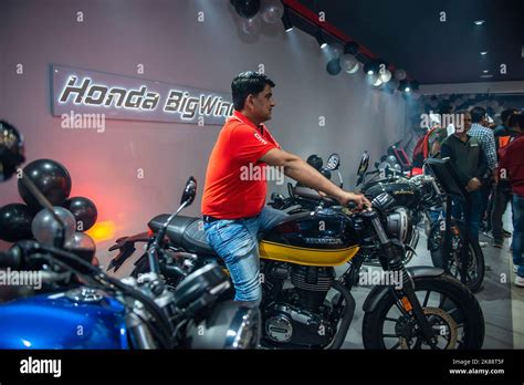 A Customer Checks Out Honda Cb 350 Rs At A Honda Bigwing Showroom