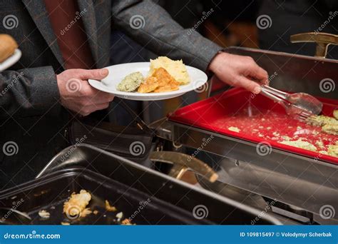 Businessman Hands Taking Food In Buffet Line Indoor In Canteen Stock