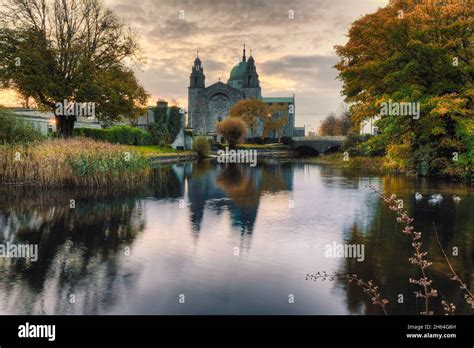 Beautiful Sunrise Scenery Of Galway Cathedral Reflected In The Corrib