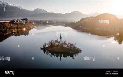 Panorama of lake bled during sunrise. Lake bled Castle in the ...