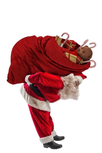 Premium Photo Santa Claus Carry A Big Sack Full O Christmas Ts