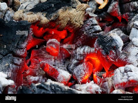 Glowing Embers In The Ash Closeup Stock Photo Alamy