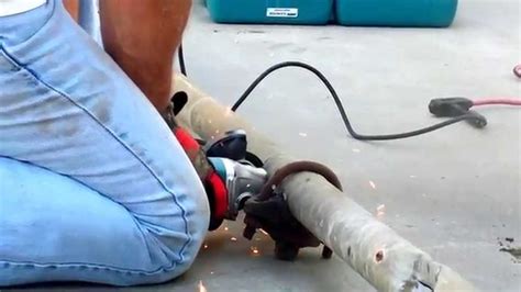 Cutting Cast Iron Drain Pipe With A Grinder Youtube