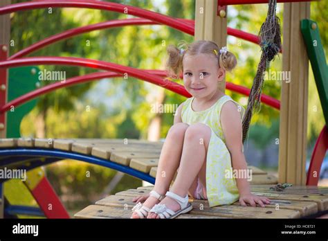 Happy Little Girl Play Joyful At Playground Stock Photo Alamy