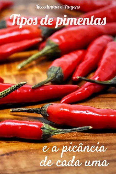 Red Peppers Are Lined Up On A Wooden Table With The Words Tipos De