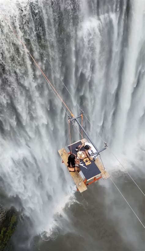 Daredevil Couple Dines At Table Hanging 295 Feet In Air Above Rapid