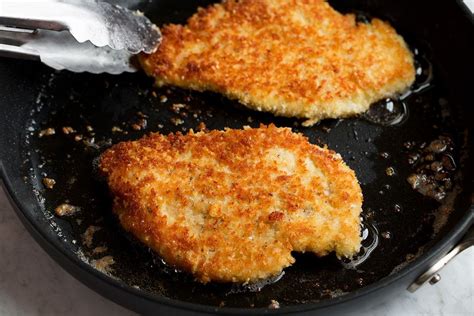 Parmesan Crusted Chicken Chicken Breasts Are Halved Into Smaller Cutlets Dredge In A