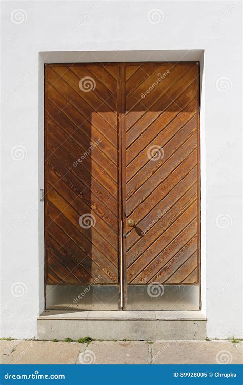 Wooden Door In White Wall Stock Image Image Of Mediterranean 89928005