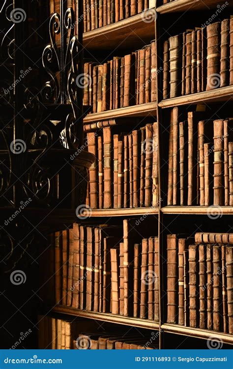 Old Books On The Shelves Inside The Old Library In Trinity College Dublin Ireland Stock Image