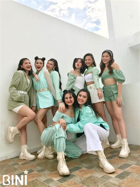 The Girls Are Posing For A Photo In Mint Green Outfits And White Shoes