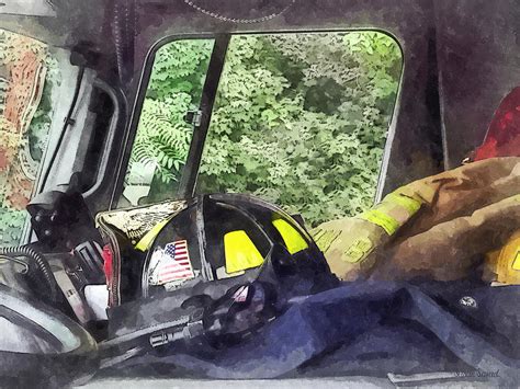 Firemen Helmet Inside Cab Of Fire Truck Photograph By Susan Savad