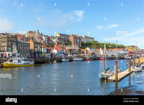 View Of Whitby Harbour Showing Fishing Boats And Private Yachts In The