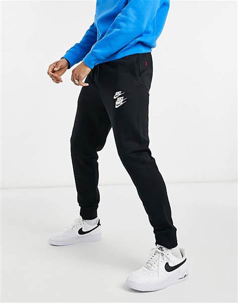 Nike World Tour Pack Graphic Cuffed Joggers In Black Asos