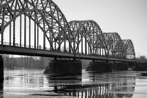 Premium Photo Black And White Photo Of A Metal Arched Bridge Over A