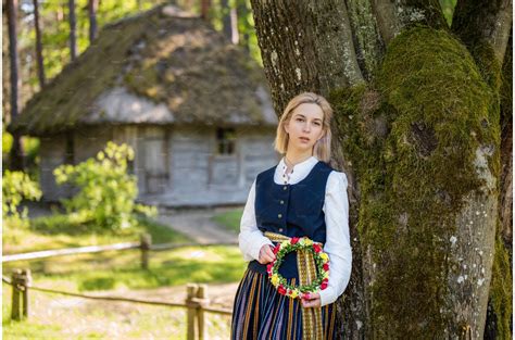 Latvian woman in traditional | People Images ~ Creative Market