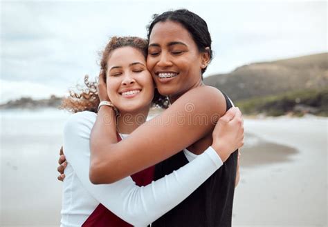 Happy Lesbian And Couple At Beach Hug For Bonding Loving Relationship And Relax Together By