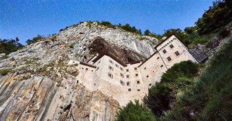 Predjama Castle Inside Game Of Thrones In Slovenian Mountain