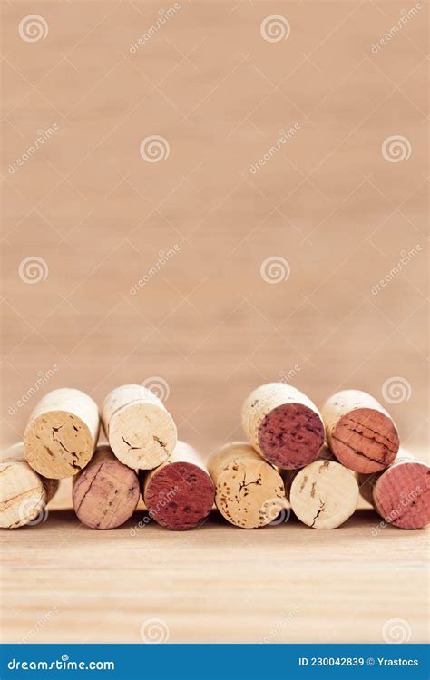 Borders Of Wine Corks On Blurred Wooden Background Vertical Format