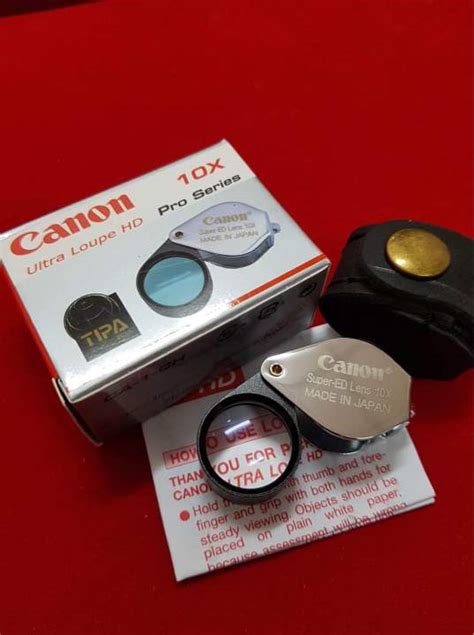 กล้องส่องพระ Canon 10x 18mmบอดี้ สีเงิน Ultra Loupe Hd Pro Series Ca