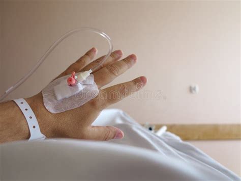 Patient S Hand In The Hospital With An Iv Stock Image Image Of Help