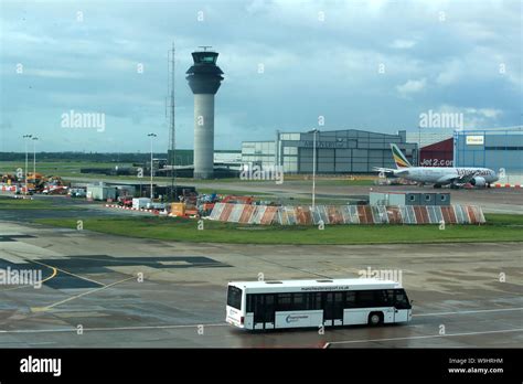 Baggage Handlers On The Runway At Terminal One Manchester Airport Hi