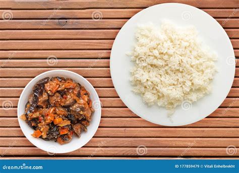 White Rice On A White Plate Rice On A Coloted Background Top View