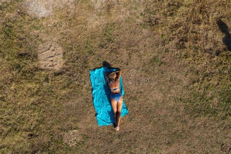 Aerial View Of Blonde Woman In Bikini Sunbathing Stock Photo Image Of