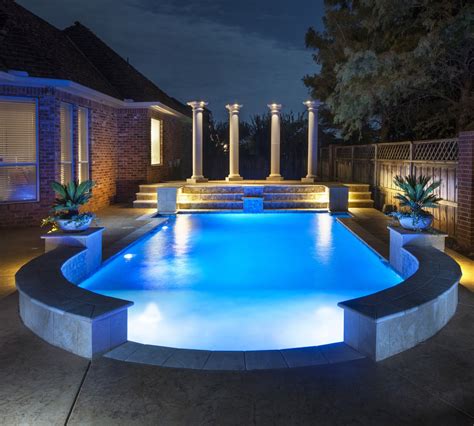 Night Shot Of Our Greek Style Pool With Columns And Led Water