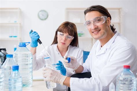 The Two Chemists Working In The Lab Two Chemists Working In The Lab