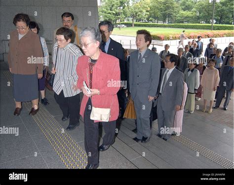 OSAKA Japan Plaintiffs And Their Lawyers And Supporters Walk Into