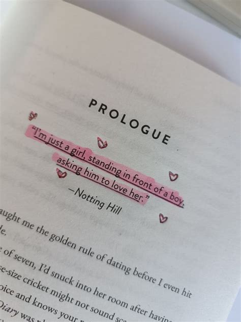 An Open Book With The Words Prologue Written In Pink And Black On It