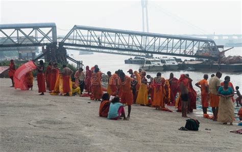 Pilgrim People Are Taking Bath At The Riverbank Of The Ganges Or River