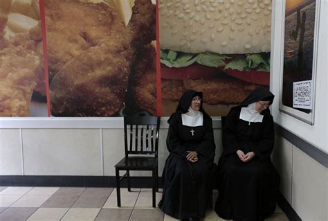 Nuns Sit At A Fast Food Restaurant Downtown Of Guatemala City Fubiz