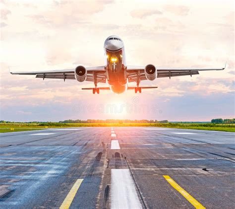 Airplane Landing On Runway Touchdown Close Up Side View Fuselage Stock