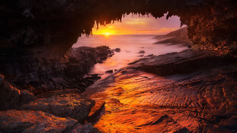 Hd Wallpaper Of Sunset Over The Ocean From A Cave