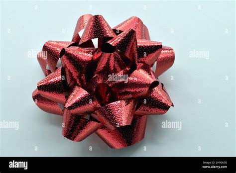 Christmas Gift Wrapping Bow Large Glossy Red Bow Stock Photo Alamy