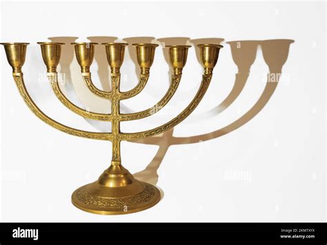 Ancient Ritual Candle Menorah On A White Background Beautiful Golden