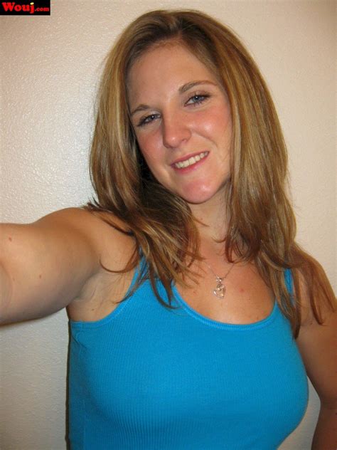 Desirable Brunette Girl Posing In Black Lingerie On The Couch 22 Photos