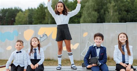 Students in School Uniform Smiling Together · Free Stock Photo