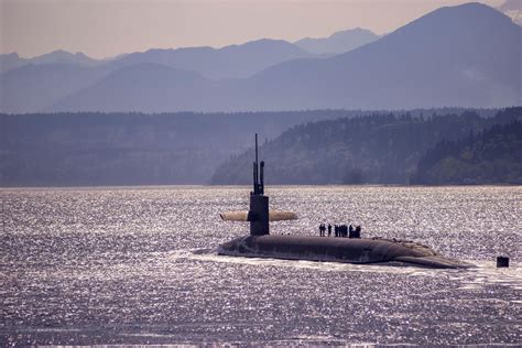 The ballistic missile submarine USS Louisiana (SSBN -743) travels in ...