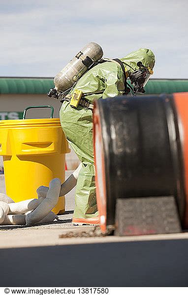 Hazmat Firefighter Arranging Chemical Hazmat Boom Hazmat Firefighter