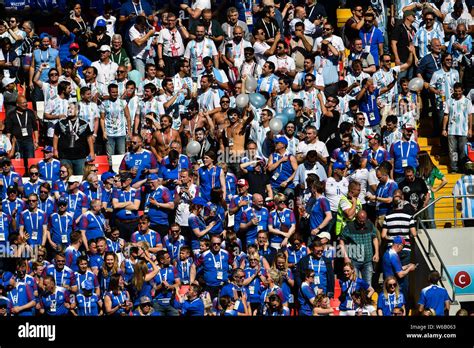 Football Fans Wave Flags And Shout Slogans To Show Their Support For