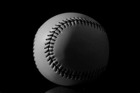 Premium Photo Close Up Of Baseball Against Black Background