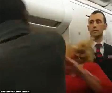 Shocking Moment Aggressive Passenger Hits A Female Flight Attendant In