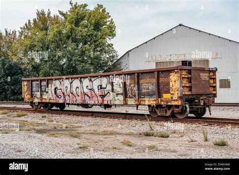 Railroad car graffiti on an empty gondola car on a siding in Montgomery ...