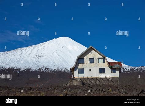 Snow Capped Peak Of Antuco Volcano 2 979 Metres Rising Above The