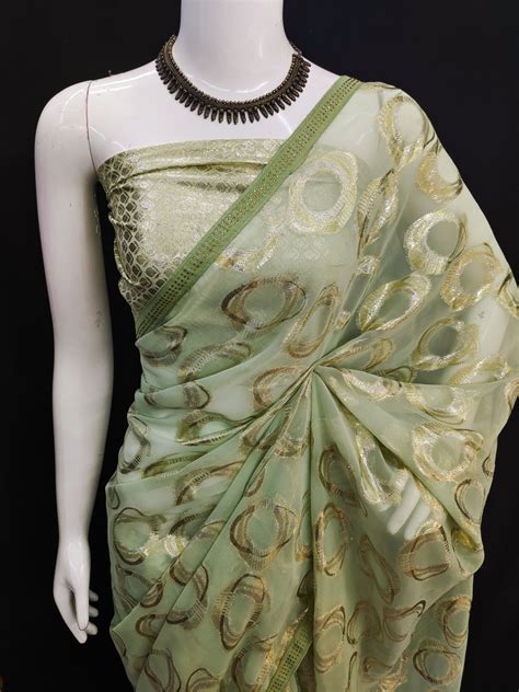 Pista Green Color Soft Georgette Saree With Zari Weaving Work