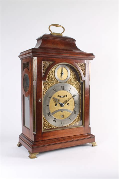 A Rare German Mahogany Table Clock Of Day Duration By Peter Behrens